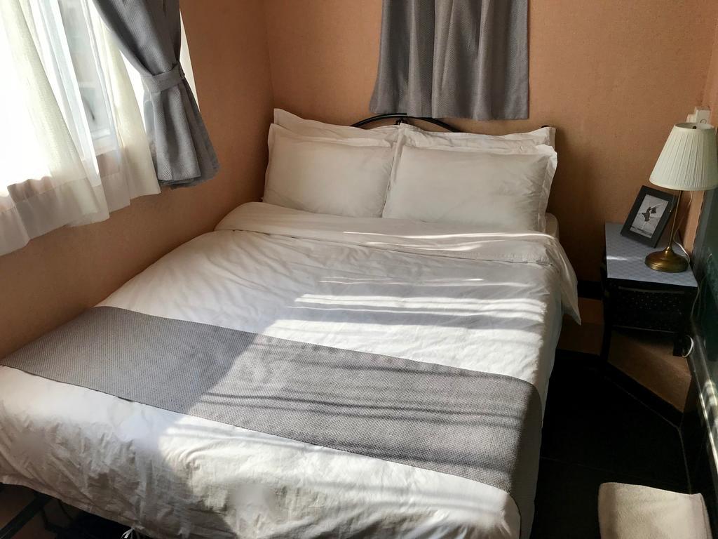 Bloomy Hotel Hong Kong Room photo
